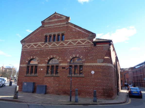 View of the 'The Old Brewery' building on High Court Lane and the Calls. The Bench Mark is just on the Calls frontage near the blue car (taken Feb 23 2016).