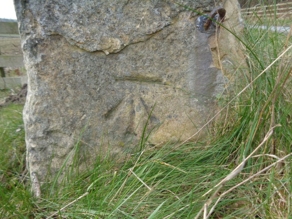 Close-up of the eroded Bench Mark on a stone pillar at the junction of Eccup Lane and High Weardley Lane, leeds (taken on Leap Year Day Feb 29 2016).