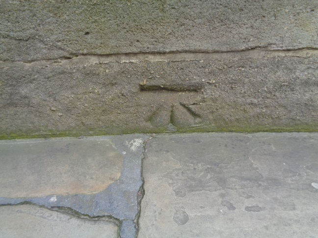 Close-up of the old Bench Mark on Victoria Bridge, Leeds (taken April 7 2016).