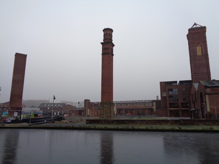 FrozenSurfaceLeedsLiverpoolCanal3TowersNearBasinLockLeedsJan312019..jpg