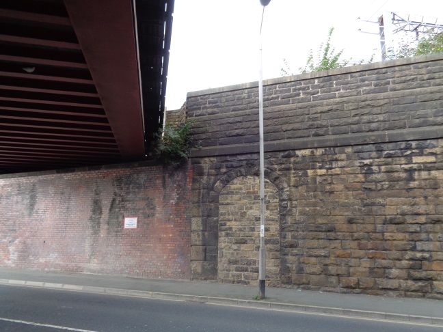 Close up of the bricked up arch (photo take Oct 20 2015).