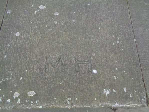 Close up of the 'MH' in Victoria Gardens near the Art Gallery, Leeds (taken March 3 2016).