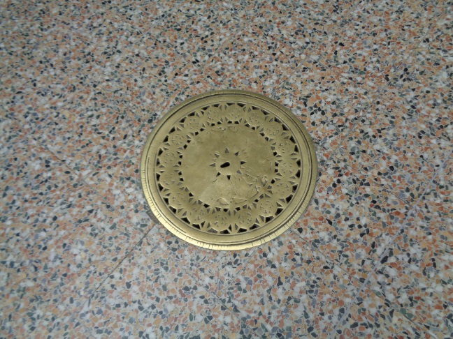 A metal cover near the Briggate end of County Arcade, Leeds (taken June 23 2016).
