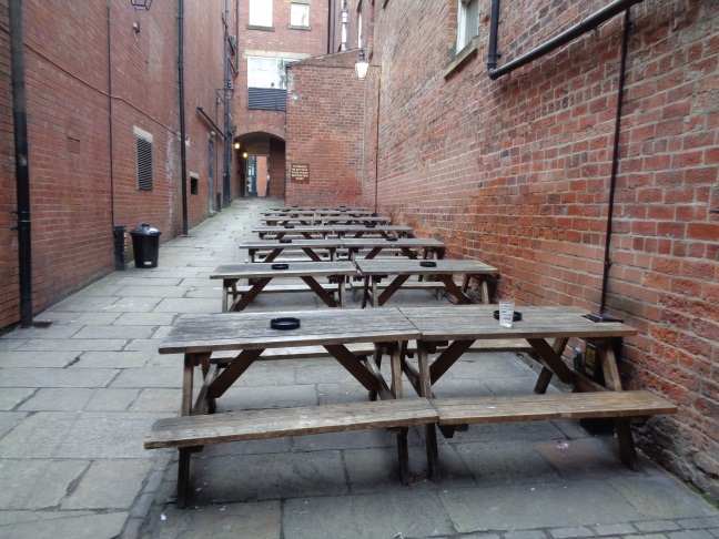 A view looking towards Lands Lane in the Angel Inn Yard between Briggate and Lands Lane, Leeds (taken 12:00 June 30 2016). Angel Inn is off to the left.