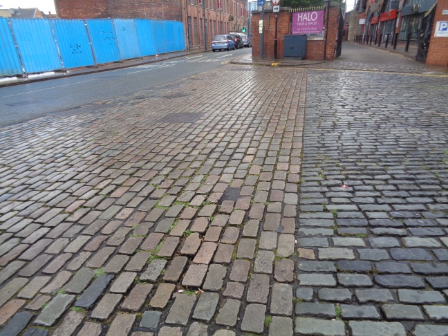 CobblesAtJunctionOfTheCalls(Left)AndCrownStreetLeedsAug092016..jpg